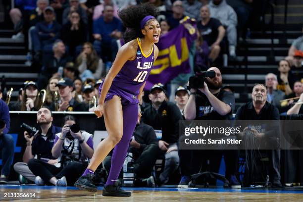 Angel Reese of the LSU Tigers reacts during the first half against the Iowa Hawkeyes in the Elite 8 round of the NCAA Women's Basketball Tournament...
