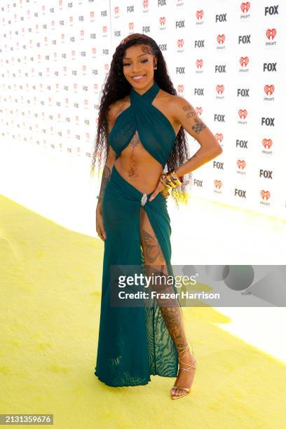 GloRilla attends the 2024 iHeartRadio Music Awards at Dolby Theatre on April 01, 2024 in Hollywood, California.