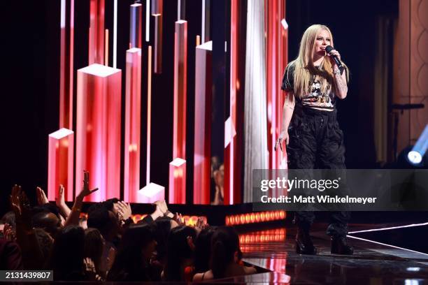 Avril Lavigne speaks onstage during the 2024 iHeartRadio Music Awards at Dolby Theatre in Los Angeles, California on April 01, 2024. Broadcasted live...