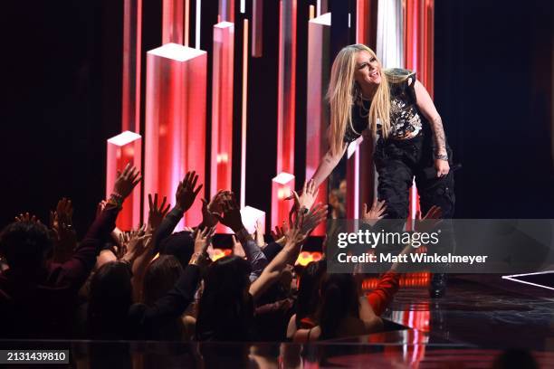 Avril Lavigne speaks onstage during the 2024 iHeartRadio Music Awards at Dolby Theatre in Los Angeles, California on April 01, 2024. Broadcasted live...