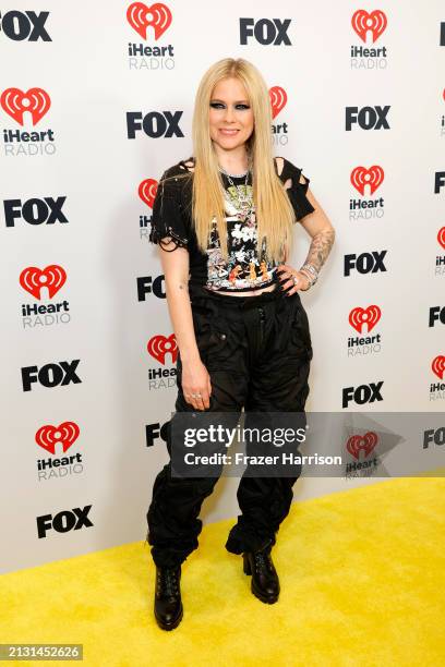 Avril Lavigne poses in the press room during the 2024 iHeartRadio Music Awards at Dolby Theatre on April 01, 2024 in Hollywood, California.