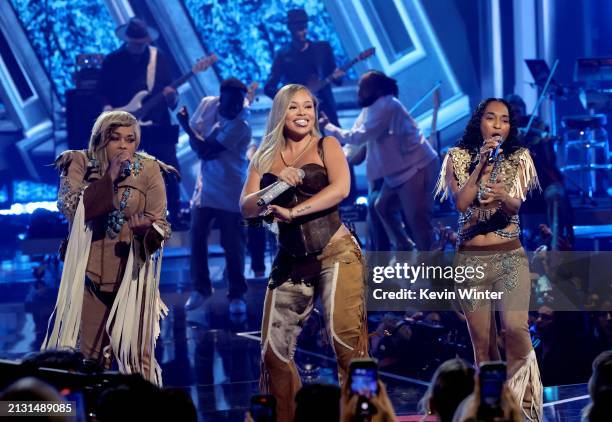 Latto performs with Tionne "T-Boz" Watkins and Rozonda "Chilli" Thomas of TLC onstage during the 2024 iHeartRadio Music Awards at Dolby Theatre in...