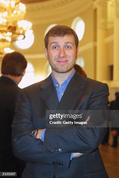 Russian businessman Roman Abramovich poses for a photograph during the Fifth Economic Forum at the Tavrichesky Palace June 13, 2001 in St....