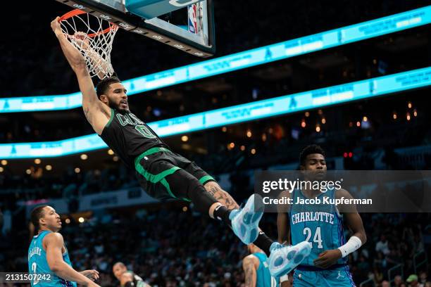 Jayson Tatum of the Boston Celtics dunks the ball in the third quarter during their game against the Charlotte Hornets at Spectrum Center on April...