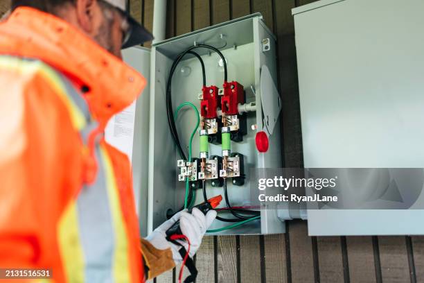 solar panel electric box installation in the pacific northwest - fuse box stock pictures, royalty-free photos & images