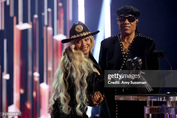 Beyoncé accepts the Innovator Award from Stevie Wonder onstage during the 2024 iHeartRadio Music Awards at Dolby Theatre on April 01, 2024 in...