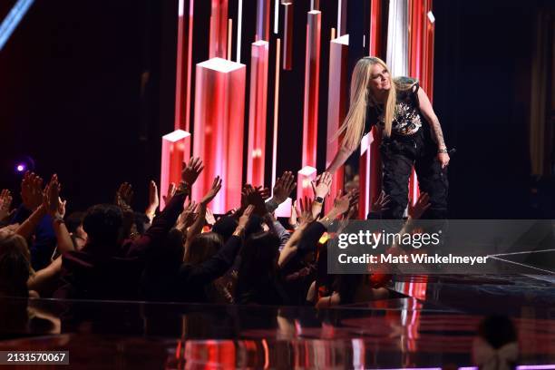 Avril Lavigne speaks onstage during the 2024 iHeartRadio Music Awards at Dolby Theatre in Los Angeles, California on April 01, 2024. Broadcasted live...
