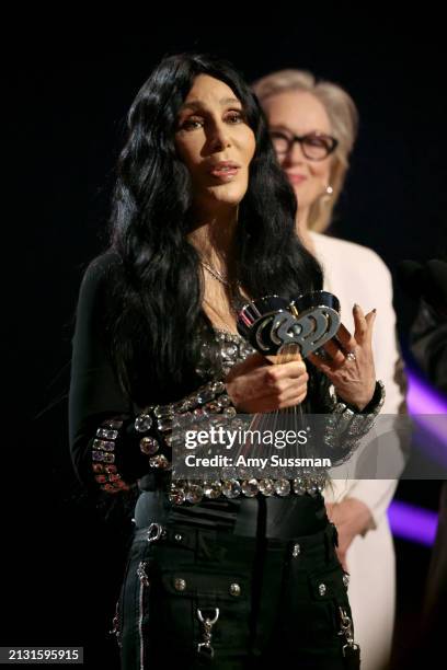 Cher accepts the Icon Award from Meryl Streep onstage during the 2024 iHeartRadio Music Awards at Dolby Theatre on April 01, 2024 in Hollywood,...