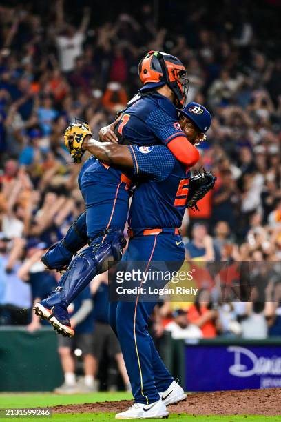Ronel Blanco celebrates with Yainer Diaz of the Houston Astros after pitching a no hitter against the Toronto Blue Jays at Minute Maid Park on April...