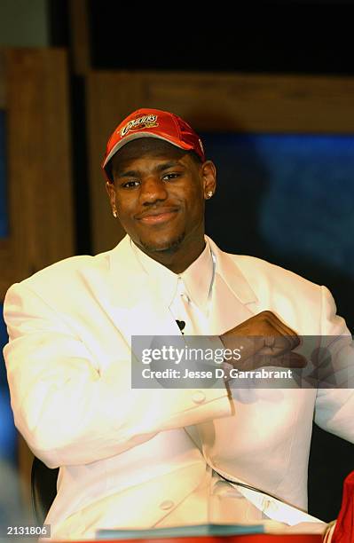 LeBron James who was selected by the Cleveland Cavaliers reacts during the 2003 NBA Draft at the Paramount Theatre at Madison Square Garden on June...