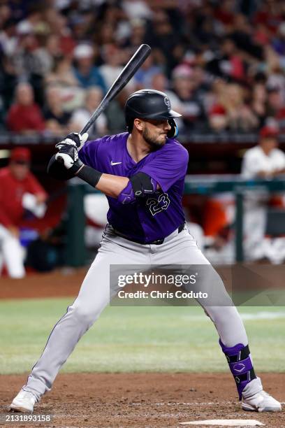Kris Bryant of the Colorado Rockies bats during the game against the Arizona Diamondbacks at Chase Field on March 29, 2024 in Phoenix, Arizona. The...