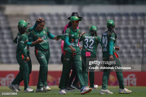 Bangladesh's players celebrate with team mate Fariha Trisna after she took a hat trick during game two of the Women's T20 International series...