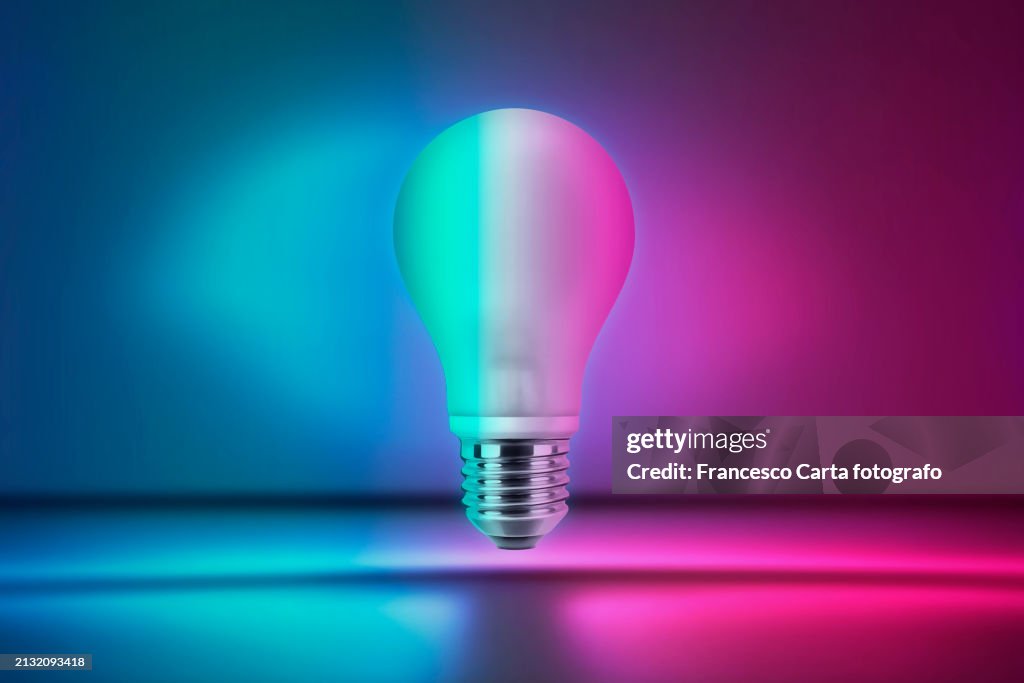 Light Bulb Against Purple and Blue Background
