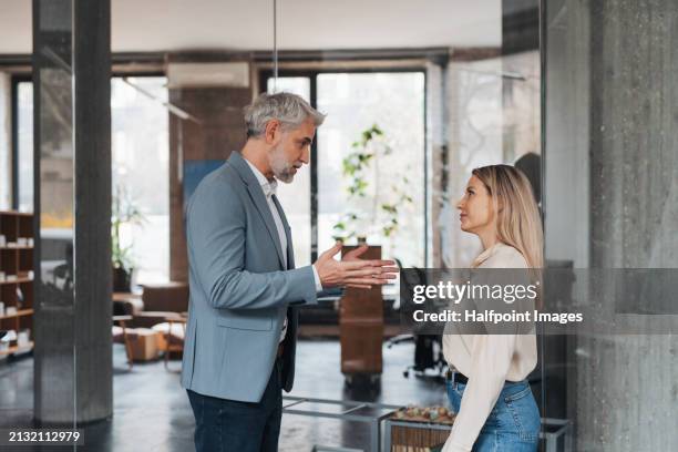 manager scolding employee in modern office. project manager making mistake. company director is angry, dissatisfied for worker's poor quality work and missed deadline. - annoying colleague stock pictures, royalty-free photos & images
