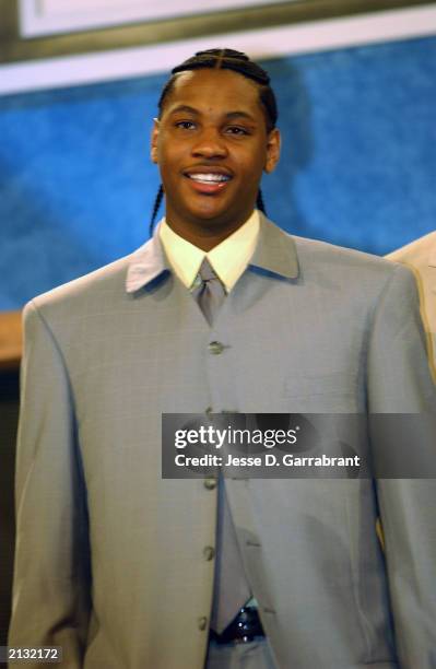 Carmelo Anthony who was selected by the Denver Nuggets looks on during the 2003 NBA Draft at the Paramount Theatre at Madison Square Garden on June...