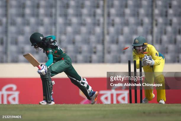 Alyssa Healy of Australia attempts to stump Shorna Akter of Bangladesh during game two of the Women's T20 International series between Bangladesh and...