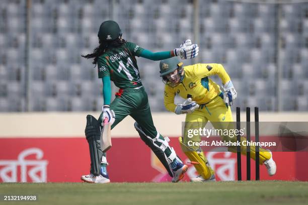 Alyssa Healy of Australia attempts to stump Shorna Akter of Bangladesh during game two of the Women's T20 International series between Bangladesh and...