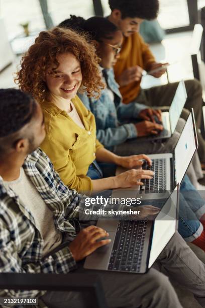 happy programmers working on innovative computer language in the office. - computer algorithm stock pictures, royalty-free photos & images