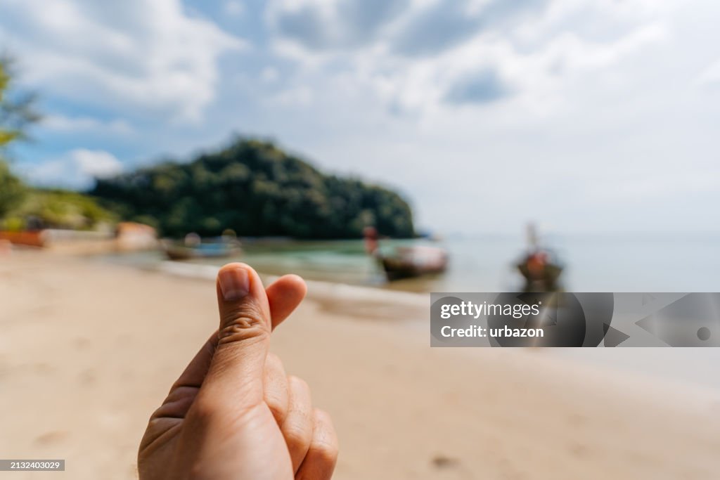 Young Man Making A Finger Heart On The Ao Nang Beach In Thailand