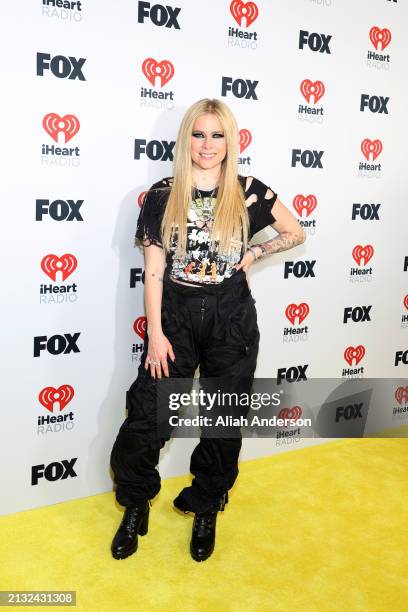 Avril Lavigne poses in the press room during the 2024 iHeartRadio Music Awards at Dolby Theatre on April 01, 2024 in Hollywood, California.