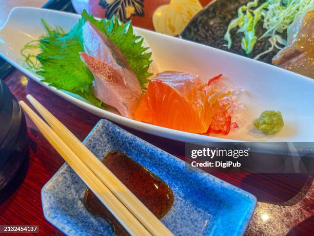 elegant sashimi selection in teishoku set - red saucer stock pictures, royalty-free photos & images