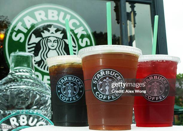 Starbucks' new iced coffee and tea beverages are displayed during a promotion July 2, 2003 outside a Starbucks coffee shop at Dupont Circle in...