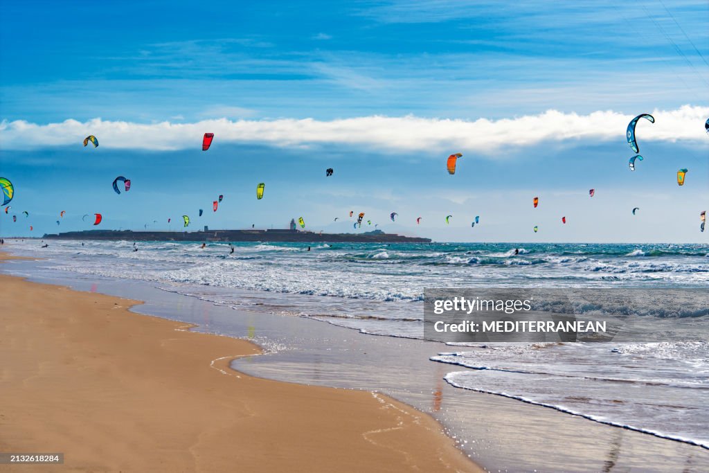 Tarifa beach in Cadiz surf city skyline of Andalusia Spain with lots of kitesurfing kites