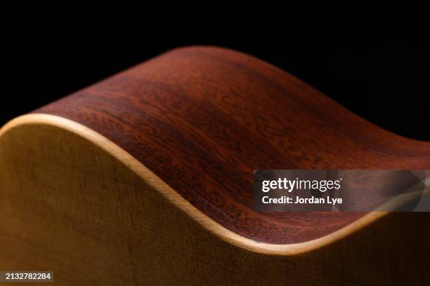 acoustic guitar detail - musical instrument string stock pictures, royalty-free photos & images