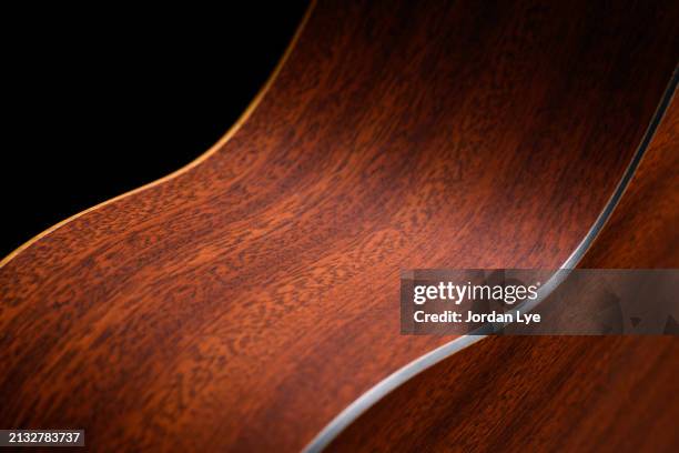 acoustic guitar detail - mahagoniholz stock-fotos und bilder