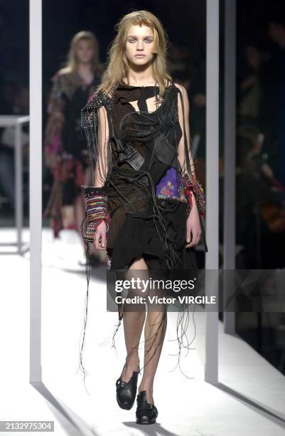 Natalia Vodianova walks the runway during the Hussein Chalayan Ready to Wear Fall/Winter 2002-2003 fashion show as part of the Paris Fashion Week on...