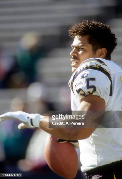 Outside Linebacker Junior Seau of the San Diego Chargers follows the action in the game between the San Diego Chargers vs the New England Patriots on...