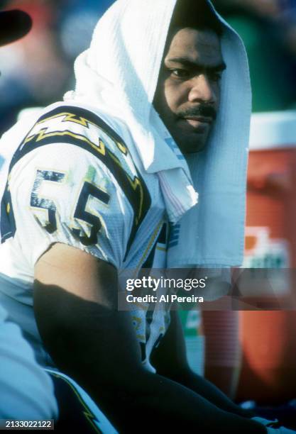 Outside Linebacker Junior Seau of the San Diego Chargers follows the action in the game between the San Diego Chargers vs the New England Patriots on...