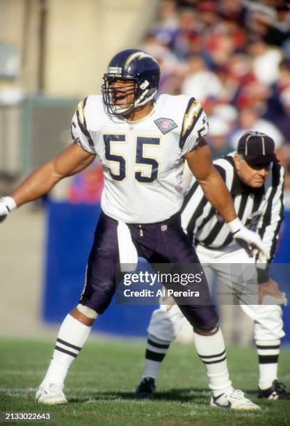 Outside Linebacker Junior Seau of the San Diego Chargers follows the action in the game between the San Diego Chargers vs the New England Patriots on...