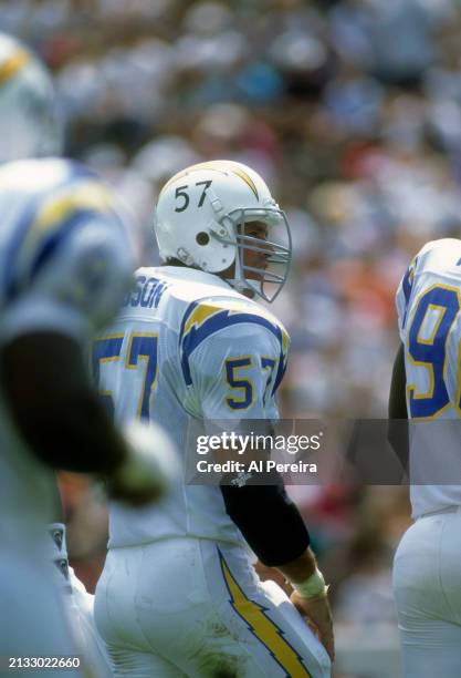 Middle Linebacker Dennis Gibson of the San Diego Chargers follows the action in the Pro Football Hall of Fame game between the San Diego Chargers vs...