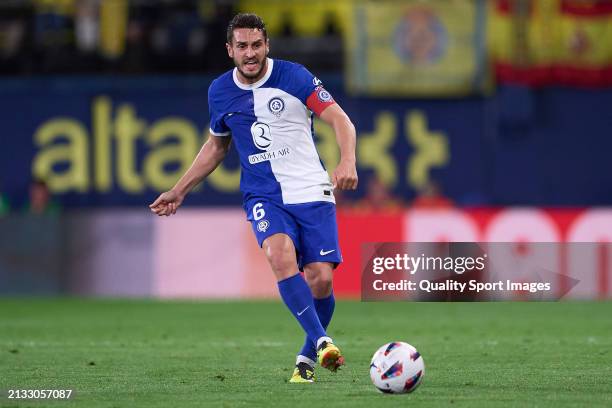 Koke Resurreccion of Atletico de Madrid passes the ball during the LaLiga EA Sports match between Villarreal CF and Atletico Madrid at Estadio de la...