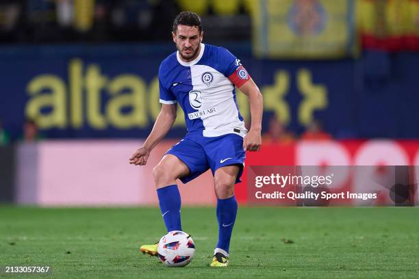 Koke Resurreccion of Atletico de Madrid passes the ball during the LaLiga EA Sports match between Villarreal CF and Atletico Madrid at Estadio de la...