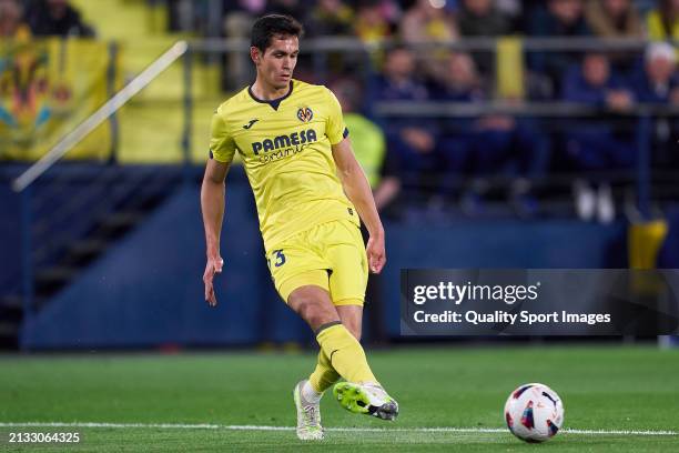 Aissa Mandi of Villarreal CF passes the ball during the LaLiga EA Sports match between Villarreal CF and Atletico Madrid at Estadio de la Ceramica on...