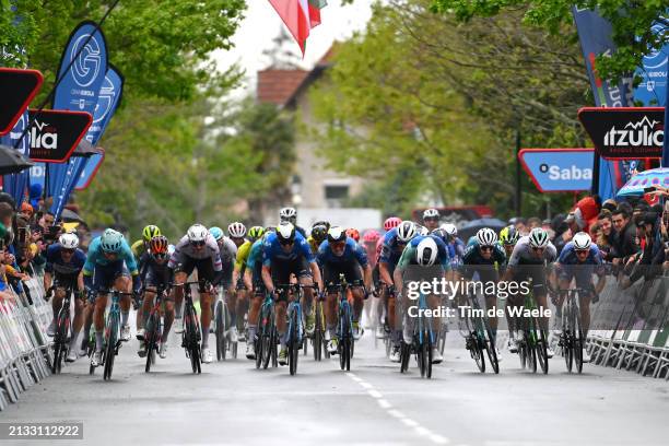 Juan Ayuso of Spain and UAE Team Emirates - Blue Best Young Rider Jersey, Gianmarco Garofoli of Italy and Astana Qazaqstan Team, Brandon Mcnulty of...