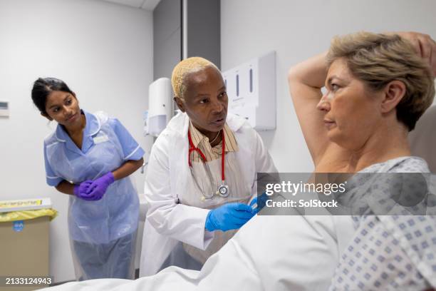 this might be uncomfortable - biopsy stock pictures, royalty-free photos & images