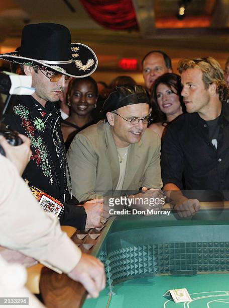 Actor David Arquette , actor Joe Pantoliano and actor Stephen Dorff prepare to wager on the 1st roll at at the opening of the Borgata Hotel Casino &...