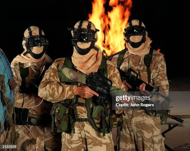 Serving members of the Elite SAS regiment in a reconstruction filmed at a cement works in Hertfordshire, UK, for a drama programme based on the...
