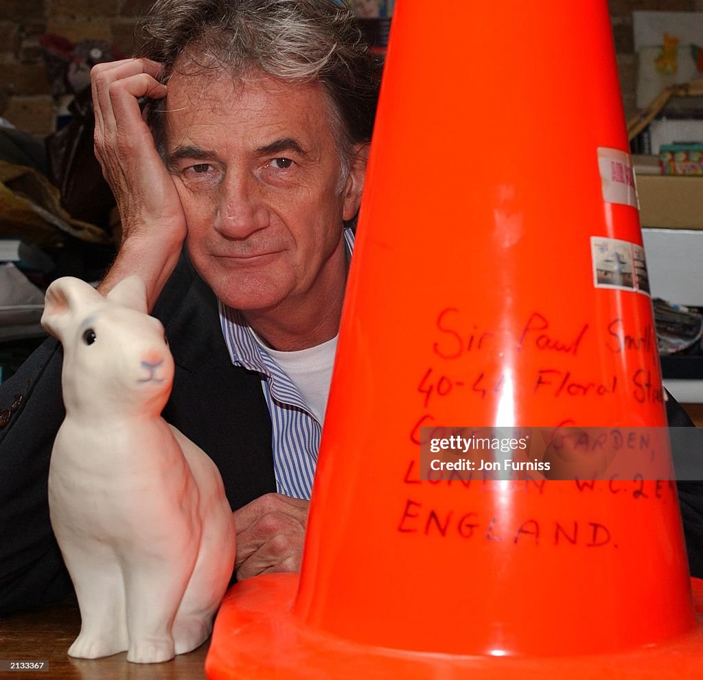Designer Sir Paul Smith in his office on 1 May 2003
