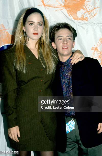 American actors Christina Applegate and David Faustino, pose for a portrait during the 1990 MTV Video Music Awards at the Universal Amphitheatre in...