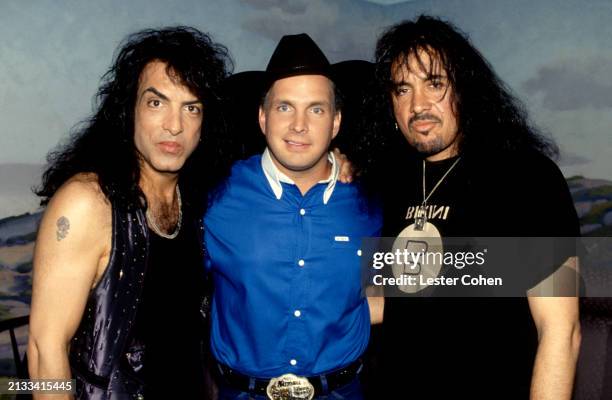American country singer Garth Brooks poses for a portrait with Paul Stanley and Bruce Kulick of the American rock band Kiss on The Tonight Show with...