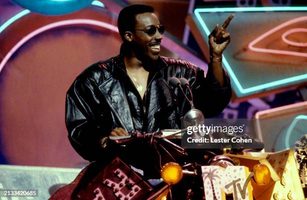 American comedian Arsenio Hall hosts the 1988 Fifth Annual MTV Video Music Awards at the Universal Ampitheater in Los Angeles, California, September...