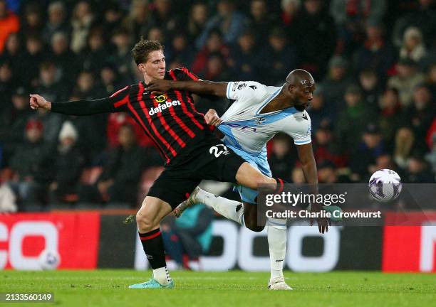 Illya Zabarnyi of AFC Bournemouth is challenged by Jean-Philippe Mateta of Crystal Palace during the Premier League match between AFC Bournemouth and...