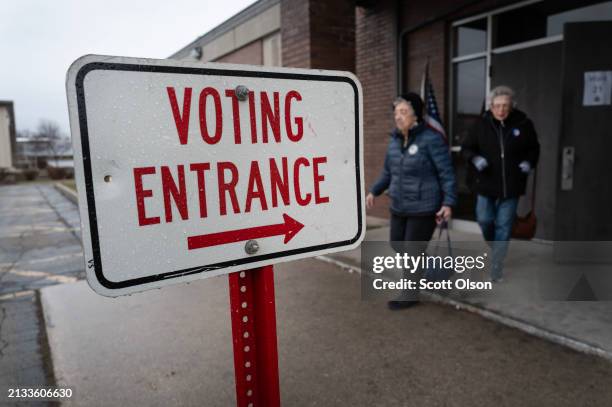 Residents leave a polling place after voting in the state's primary election on April 02, 2024 in Green Bay, Wisconsin. Republican presidential...