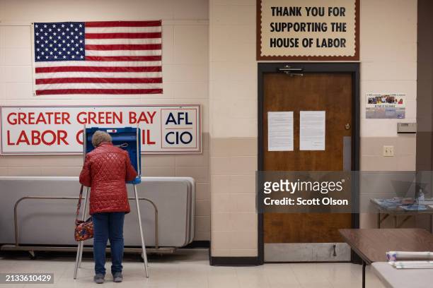 Resident casts their ballot in the state's primary election at a polling location on April 02, 2024 in Green Bay, Wisconsin. Republican presidential...
