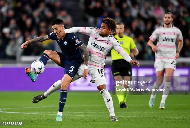 Matias Vecino of SS Lazio controls the ball whilst under pressure from Weston McKennie of Juventus during the Coppa Italia Semi-Final match between...