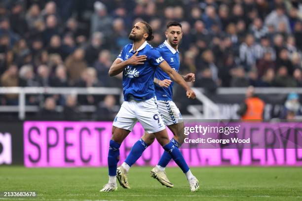 Dominic Calvert-Lewin of Everton celebrates scoring his team's first goal from a penalty kick during the Premier League match between Newcastle...